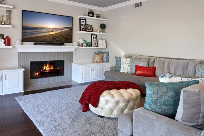 Gray fireplace in the living room interior